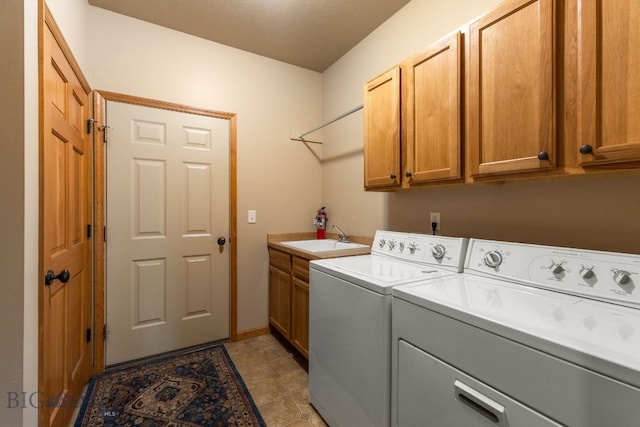 3300 E Graf Unit 26, Bozeman, MT 59715 - washroom featuring cabinet space and washer and clothes dryer