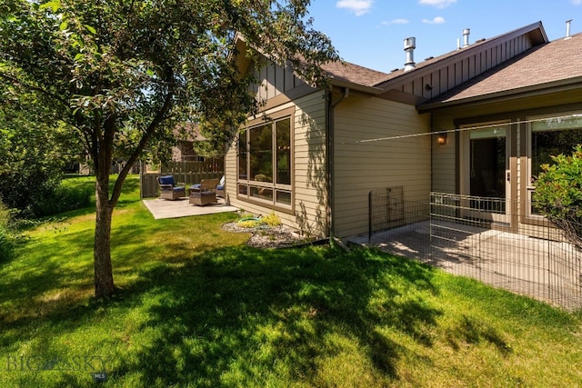 3300 E Graf Unit 26, Bozeman, MT 59715 - view of green lawn featuring a patio and outdoor lounge area
