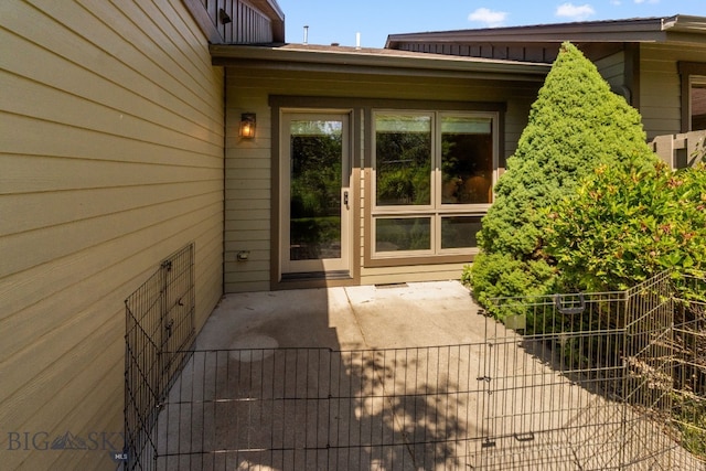 3300 E Graf Unit 26, Bozeman, MT 59715 - view of exterior entry featuring a patio
