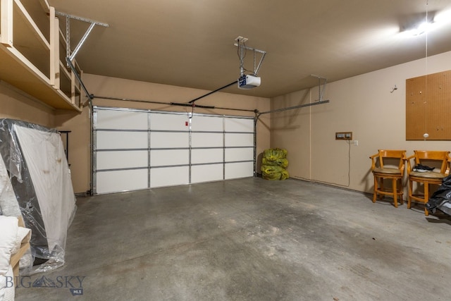 3300 E Graf Unit 26, Bozeman, MT 59715 - garage featuring a garage door opener