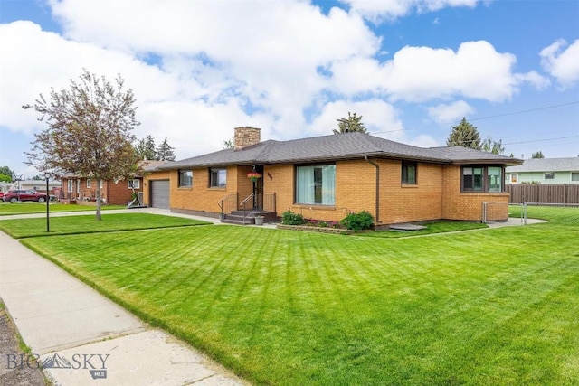 3011 Kossuth, Butte, MT 59701 - view of front of home with brick siding, a chimney, and a garage