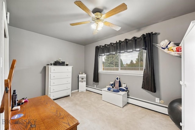 3011 Kossuth, Butte, MT 59701 - bedroom featuring a baseboard heating unit, light colored carpet, and a ceiling fan