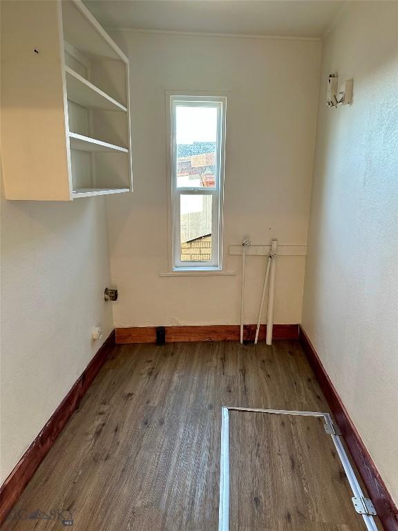110 E Center St, Butte, MT 59701 - washroom with wood finished floors and baseboards