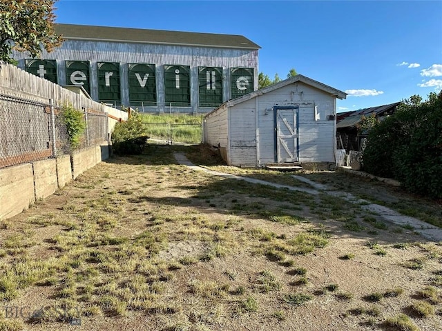 110 E Center St, Butte, MT 59701 - view of yard featuring a storage unit