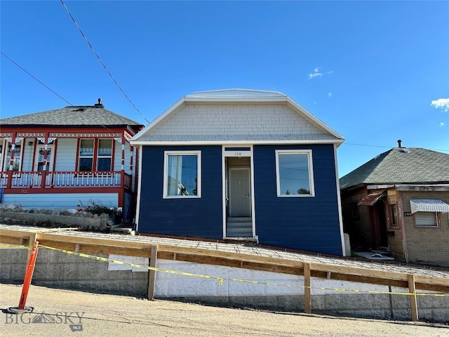 110 E Center St, Butte, MT 59701 - view of front facade with a fenced front yard