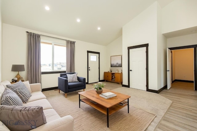 1511 Pistolero Way, Belgrade, MT 59714 - living area with high vaulted ceiling, recessed lighting, and light wood-style flooring