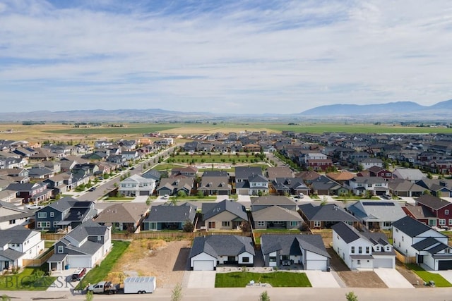 1511 Pistolero Way, Belgrade, MT 59714 - aerial overview of property's location with mountains and nearby suburban area