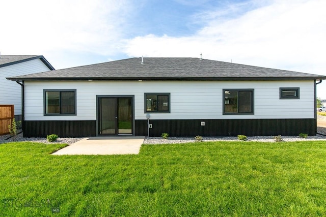 1511 Pistolero Way, Belgrade, MT 59714 - rear view of property with a lawn, a shingled roof, and a patio area