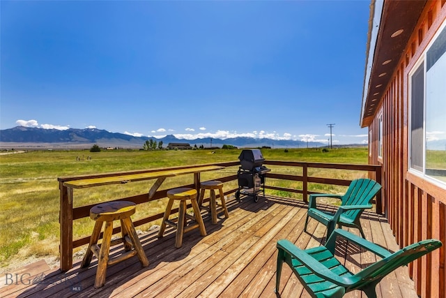 30 Hayfield Loop Trl, Ennis, MT 59729 - wooden deck featuring a mountain view, a view of countryside, and grilling area