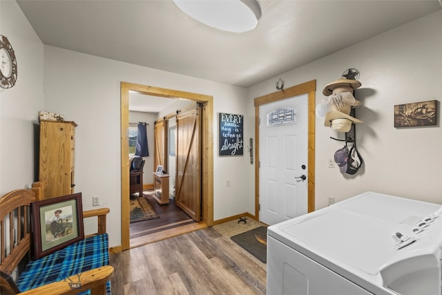 30 Hayfield Loop Trl, Ennis, MT 59729 - laundry room with washer and clothes dryer and light wood-type flooring