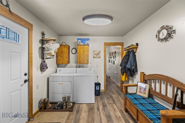30 Hayfield Loop Trl, Ennis, MT 59729 - washroom with separate washer and dryer, cabinet space, and dark wood-type flooring