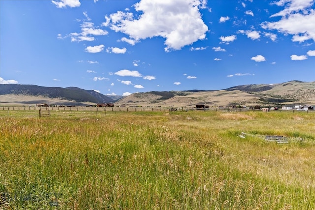 30 Hayfield Loop Trl, Ennis, MT 59729 - view of mountain backdrop with rural landscape and agricultural land