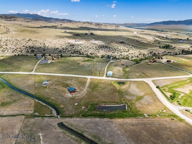 30 Hayfield Loop Trl, Ennis, MT 59729 - aerial view of property's location featuring a mountainous background and rural landscape