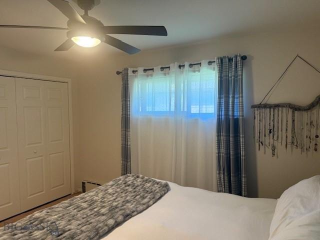 306 Juniper St, Anaconda, MT 59711 - bedroom with a ceiling fan, a closet, and baseboard heating