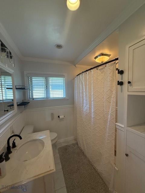 306 Juniper St, Anaconda, MT 59711 - bathroom featuring vanity, crown molding, and tile patterned floors