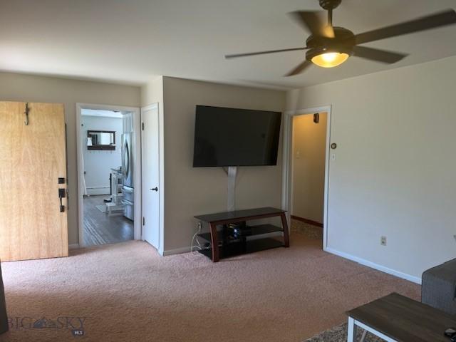 306 Juniper St, Anaconda, MT 59711 - living room with ceiling fan and carpet floors