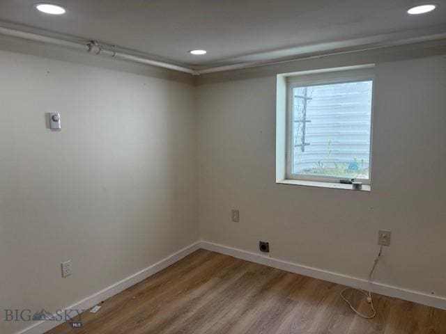 306 Juniper St, Anaconda, MT 59711 - unfurnished room with wood finished floors and recessed lighting