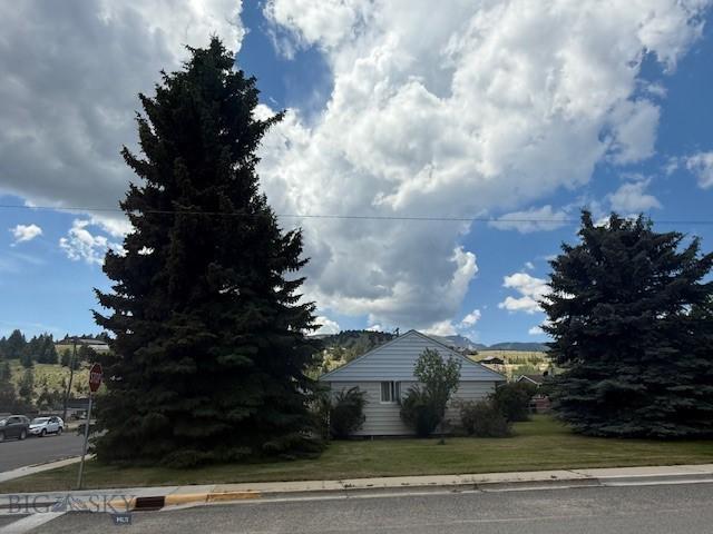 306 Juniper St, Anaconda, MT 59711 - view of home's exterior with a lawn