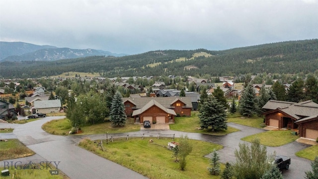8 Ringneck Dr, Big Sky, MT 59716 - aerial view of residential area with a mountainous background