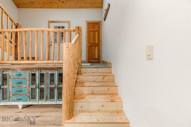 8 Ringneck Dr, Big Sky, MT 59716 - stairway featuring wood finished floors