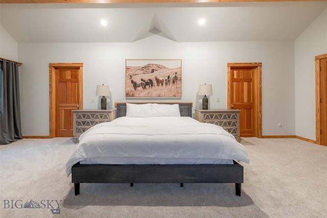 8 Ringneck Dr, Big Sky, MT 59716 - bedroom with light colored carpet and lofted ceiling