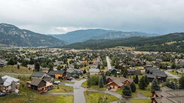 8 Ringneck Dr, Big Sky, MT 59716 - aerial perspective of suburban area featuring a mountain backdrop