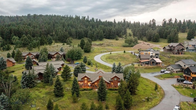 8 Ringneck Dr, Big Sky, MT 59716 - aerial view of residential area featuring a heavily wooded area