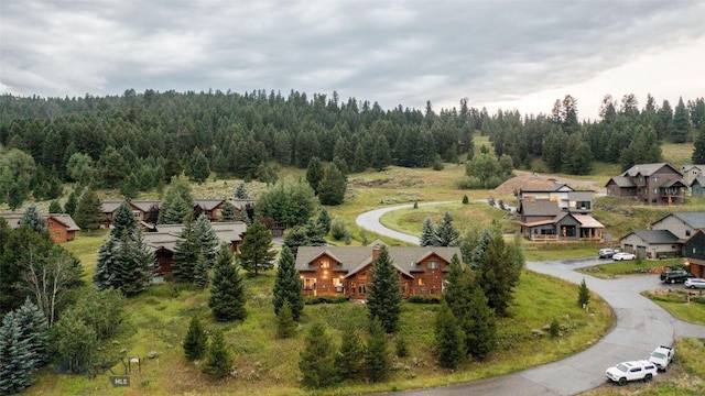 8 Ringneck Dr, Big Sky, MT 59716 - aerial view of residential area featuring a heavily wooded area