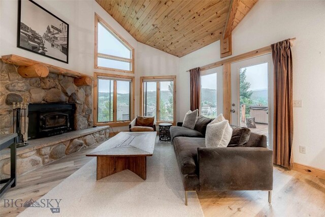 8 Ringneck Dr, Big Sky, MT 59716 - living area with light wood-type flooring, wood ceiling, plenty of natural light, and high vaulted ceiling