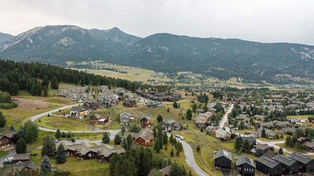 8 Ringneck Dr, Big Sky, MT 59716 - view of property location featuring a mountainous background and nearby suburban area