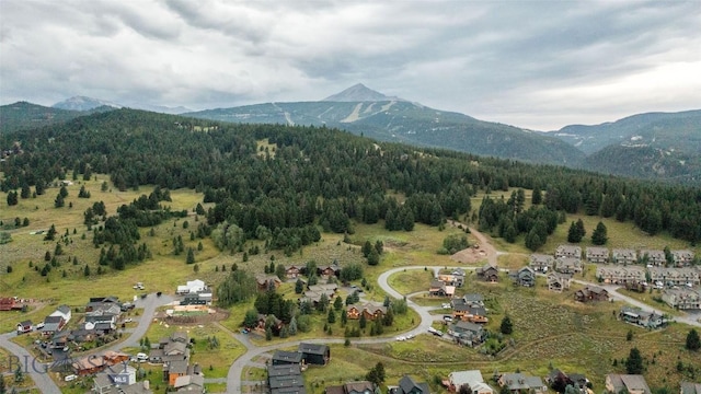 8 Ringneck Dr, Big Sky, MT 59716 - aerial overview of property's location with a mountainous background