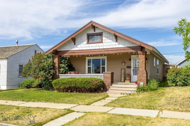1039 Placer St, Butte, MT 59701 - view of front of home with a porch and a front yard