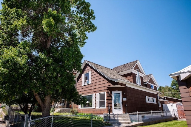 706 Locust St, Anaconda, MT 59711 - view of front facade with a fenced front yard