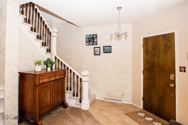 706 Locust St, Anaconda, MT 59711 - entrance foyer with stairway, a chandelier, light tile patterned floors, and wallpapered walls