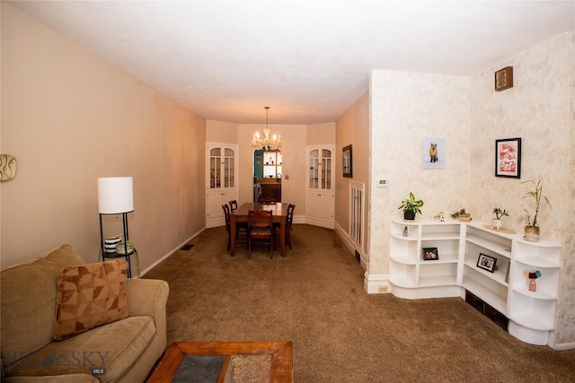 706 Locust St, Anaconda, MT 59711 - dining area featuring a chandelier and carpet floors