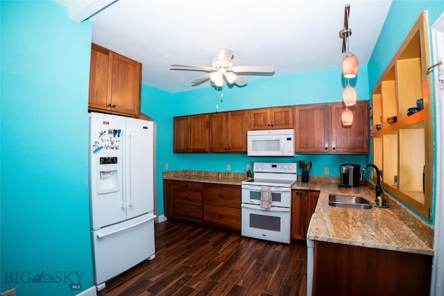 706 Locust St, Anaconda, MT 59711 - kitchen with white appliances, a ceiling fan, brown cabinets, and dark wood-style floors