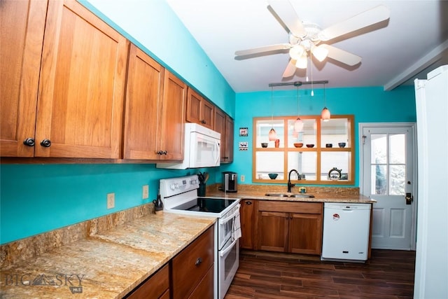 706 Locust St, Anaconda, MT 59711 - kitchen with white appliances, brown cabinets, dark wood-type flooring, and ceiling fan
