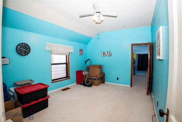 706 Locust St, Anaconda, MT 59711 - miscellaneous room with vaulted ceiling, a ceiling fan, and carpet floors