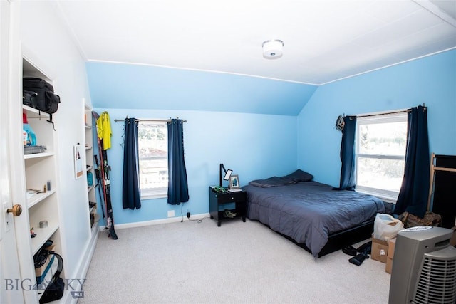 706 Locust St, Anaconda, MT 59711 - carpeted bedroom with vaulted ceiling and baseboards
