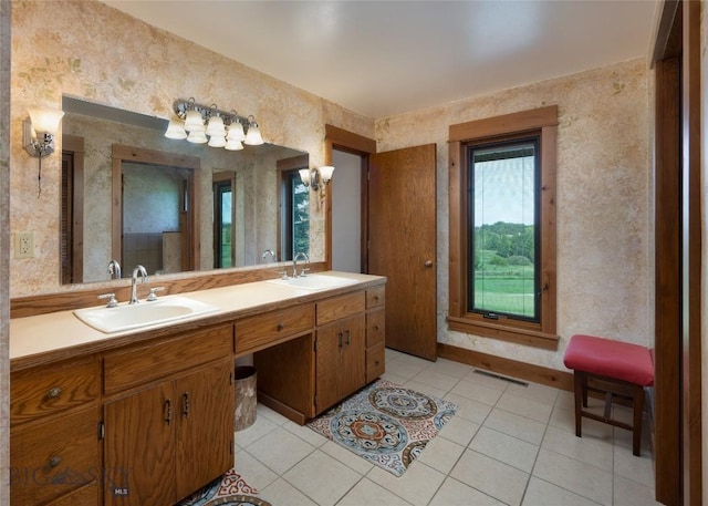 1520 Black Bull Trl, Bozeman, MT 59718 - bathroom featuring double vanity and tile patterned floors