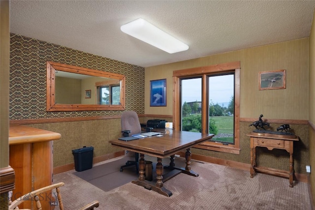 1520 Black Bull Trl, Bozeman, MT 59718 - home office featuring wallpapered walls, a textured ceiling, and carpet
