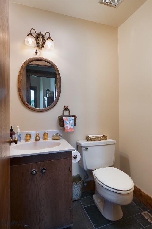 1520 Black Bull Trl, Bozeman, MT 59718 - bathroom featuring vanity and tile patterned floors
