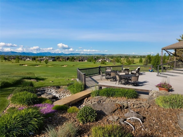 1520 Black Bull Trl, Bozeman, MT 59718 - surrounding community featuring outdoor dining area and a deck with mountain view