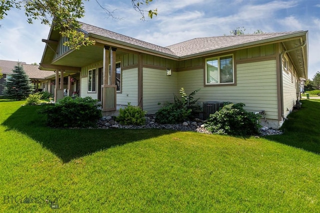 2757 Marlyn Ct Unit 1, Bozeman, MT 59718 - back of house featuring a yard and board and batten siding