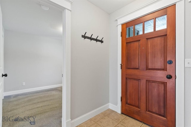 2757 Marlyn Ct Unit 1, Bozeman, MT 59718 - foyer featuring baseboards and light tile patterned flooring