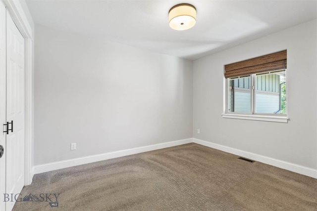 2757 Marlyn Ct Unit 1, Bozeman, MT 59718 - carpeted empty room featuring baseboards