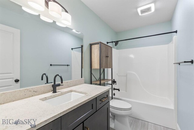 2757 Marlyn Ct Unit 1, Bozeman, MT 59718 - bathroom featuring vanity and shower / bathtub combination