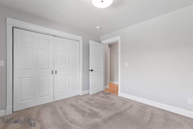 2757 Marlyn Ct Unit 1, Bozeman, MT 59718 - unfurnished bedroom with carpet and a closet