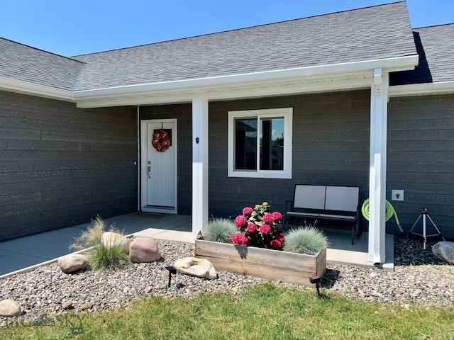 801 Pleiades Pl, Livingston, MT 59047 - entrance to property featuring roof with shingles and covered porch