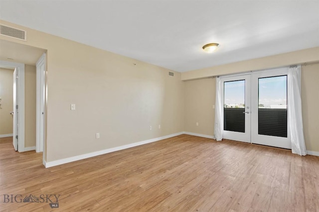 210 S Cottonwood Rd Unit 308, Bozeman, MT 59718 - unfurnished room with french doors and light wood-style floors